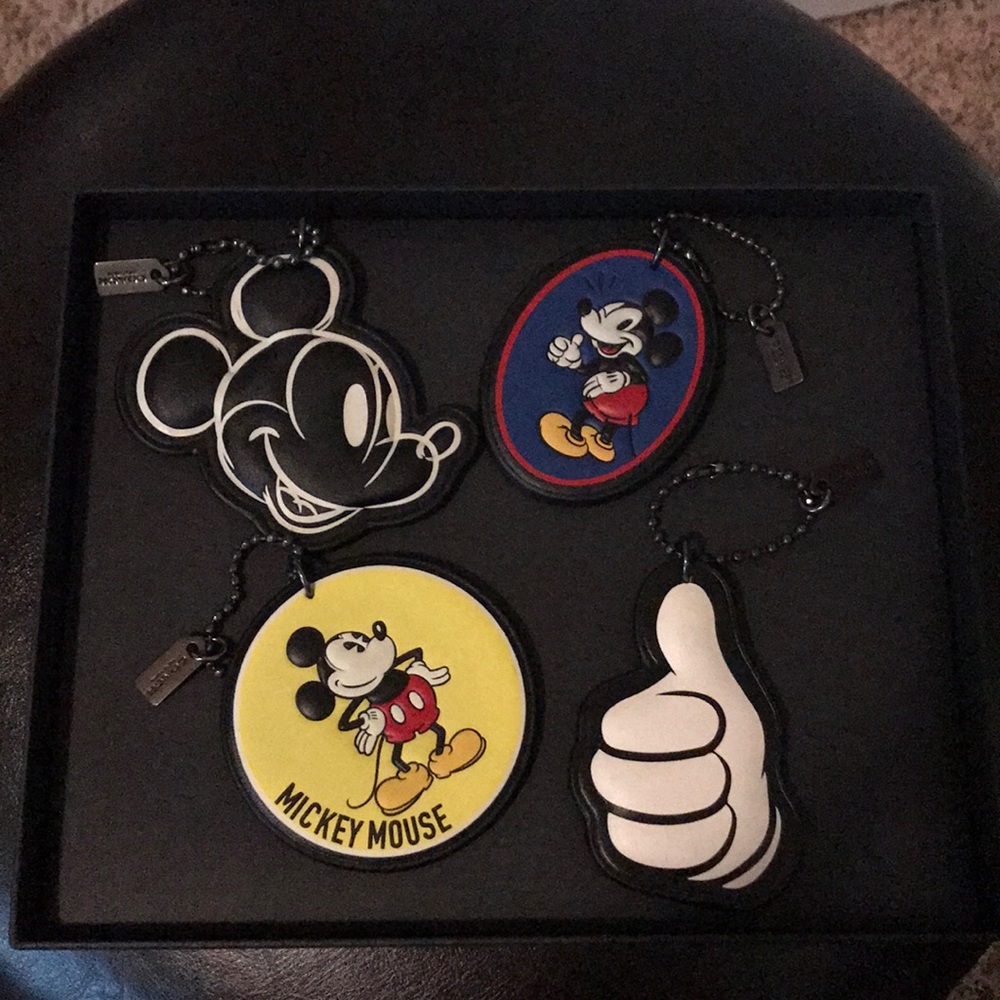 New Coach Disney set of 4 key chains bag tags